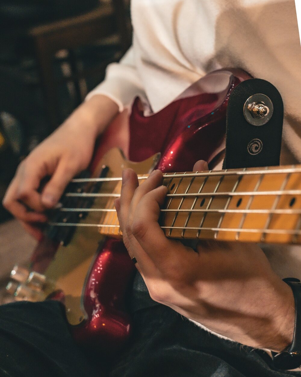 Musician playing bass guitar